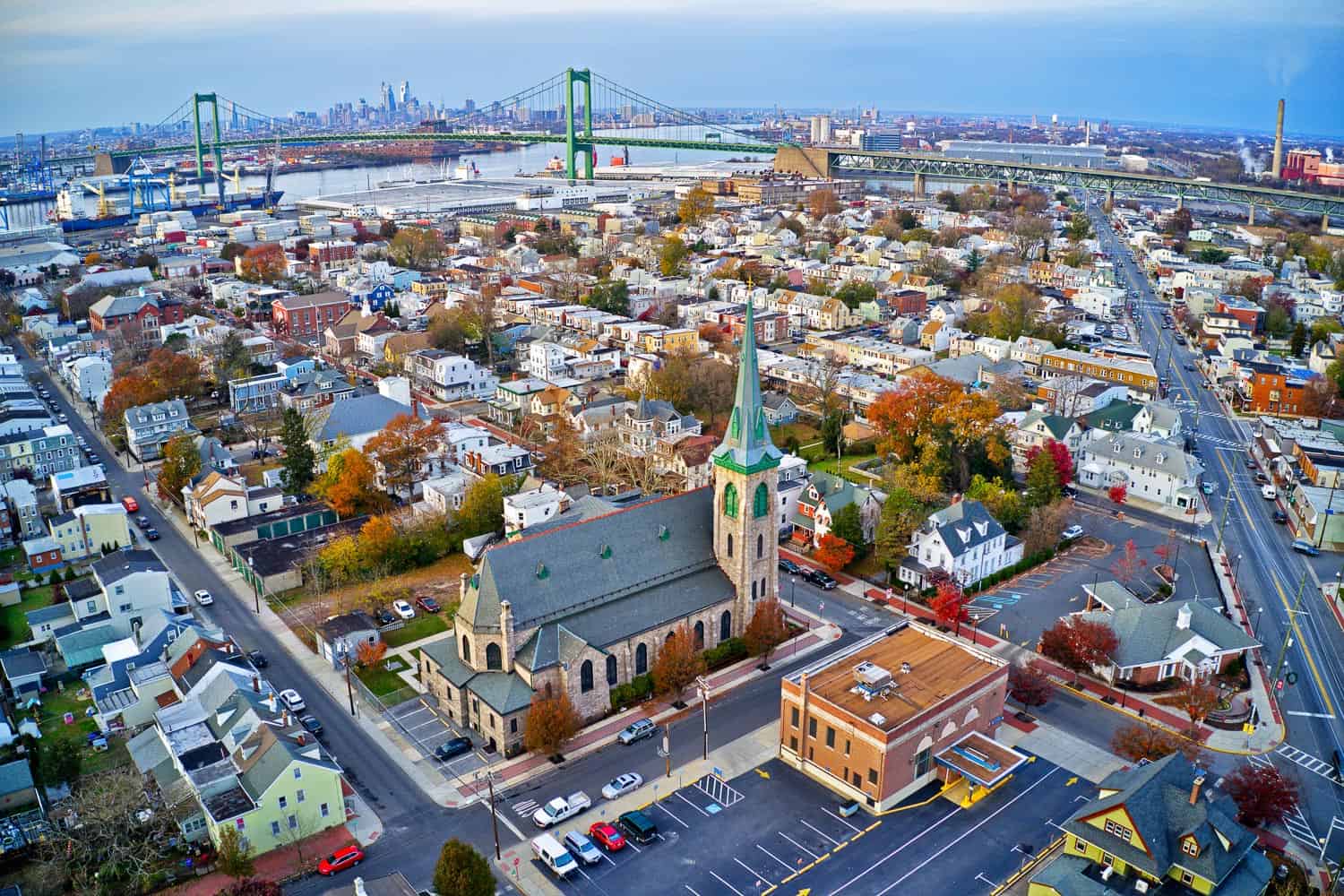 Aerial view of Gloucester City, New Jersey, with the Walt Whitman Bridge and Delaware River in the background.